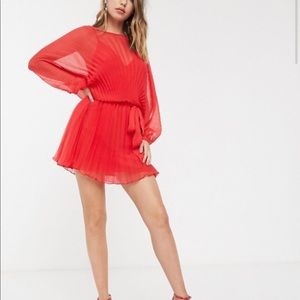 Red pleated mini dress